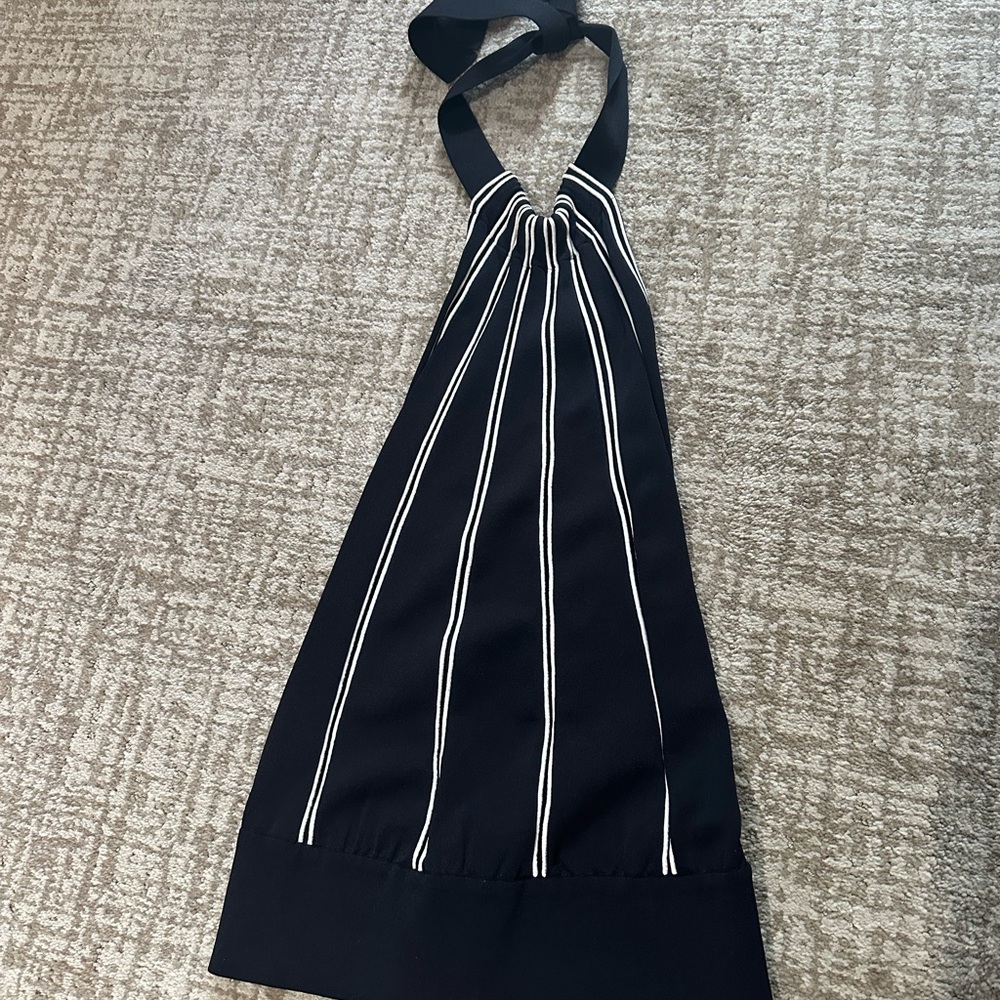 Beautiful Gucci top. Size medium  backless…. ties around the neck